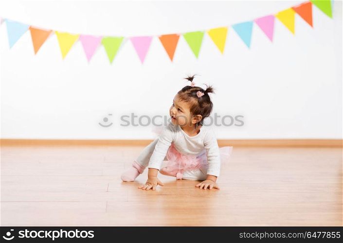 childhood, people and celebration concept - happy baby girl on birthday party. happy baby girl on birthday party. happy baby girl on birthday party