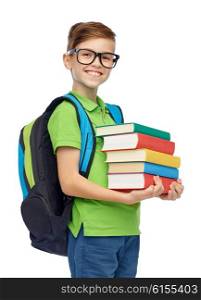 childhood, school, education and people concept - happy smiling student boy in eyeglasses with school bag and books