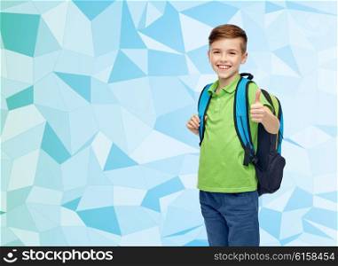 childhood, school, education and people concept - happy smiling student boy with school bag over blue low poly texture background
