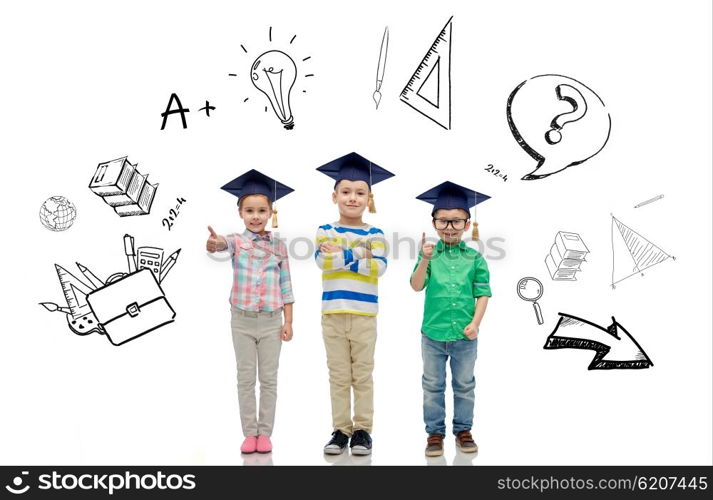 childhood, school, education, knowledge and people concept - happy children in bachelor hats or mortarboards and eyeglasses over doodles