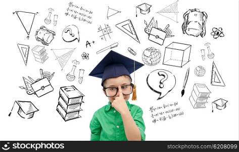 childhood, school, education, learning and people concept - happy boy in bachelor hat or mortarboard and eyeglasses with doodles