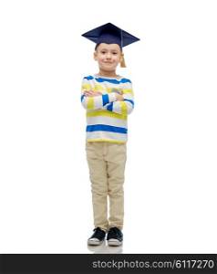 childhood, school, education, learning and people concept - happy boy in bachelor hat or mortarboard