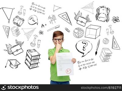 childhood, school, education, learning and people concept - happy smiling boy in eyeglasses holding paper with test result with doodles