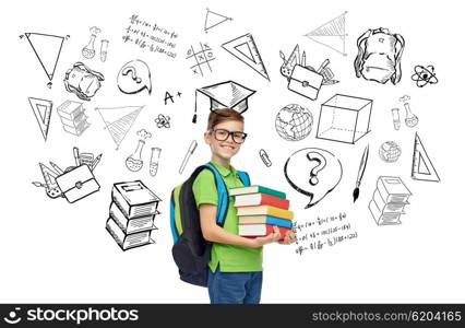 childhood, school, education, learning and people concept - happy smiling student boy in eyeglasses with school bag and books with doodles