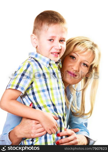 Childhood. unhappy angry crying blonde boy child kid son hugging his mother. Emotions and feelings.