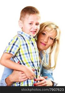 Childhood. unhappy angry crying blonde boy child kid son hugging his mother. Emotions and feelings.