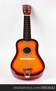 Children&acute;s Acoustic Guitar on a white background