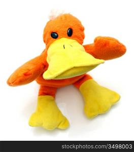 Children&acute;s bright beautiful soft toy duckling for the child on a white background