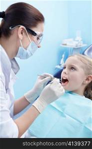 Children&acute;s doctor treats your child&acute;s teeth