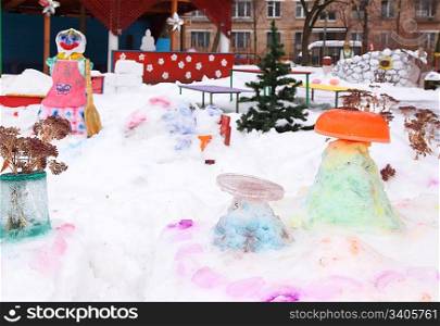 Children&acute;s playground in court yard in winter