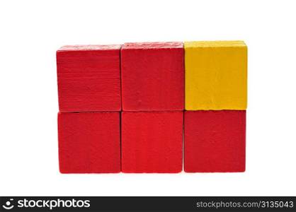 Children&acute;s wooden toy blocks isolated on white background
