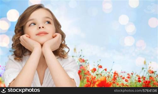 children, childhood, nature, summer and happy people concept - beautiful girl looking up and dreaming over poppy field and lights background