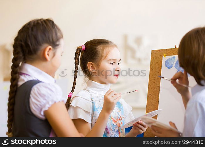 Children drawing and painting