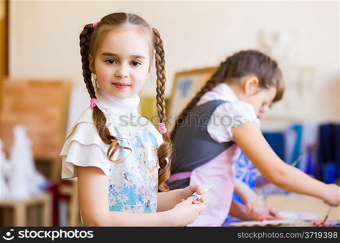 Children drawing and painting