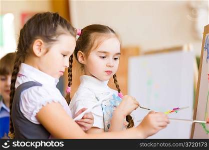 Children drawing and painting