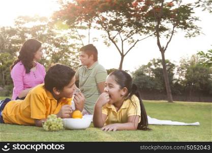 Children eating fruit