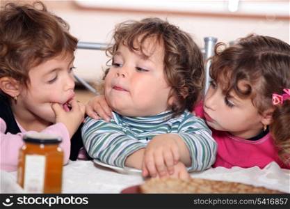 Children eating pancakes