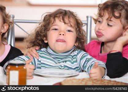 Children eating pancakes