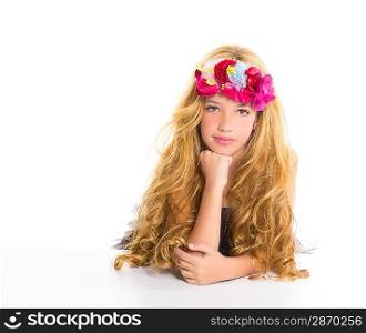 children fashion blond girl with spring flowers on head over white