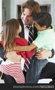 Children Greeting Father On Return From Work