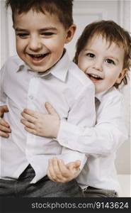 Children, happy childhood. Little boys, brothers love. Child laugh. Family, happiness.