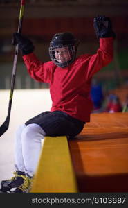 children ice hockey players, group of people, team friends waiting and relaxing on bench to start game