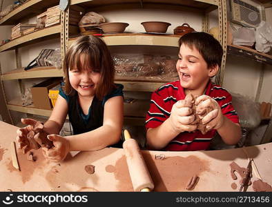 Children in a clay studio