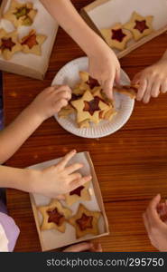 Children learn to cook cookies in the form of an asterisk. Fitness club global.. Khabarovsk, Russia - Feb17, 2018: cooking class for the production of cookies for his father in honor of the defender of the Fatherland.