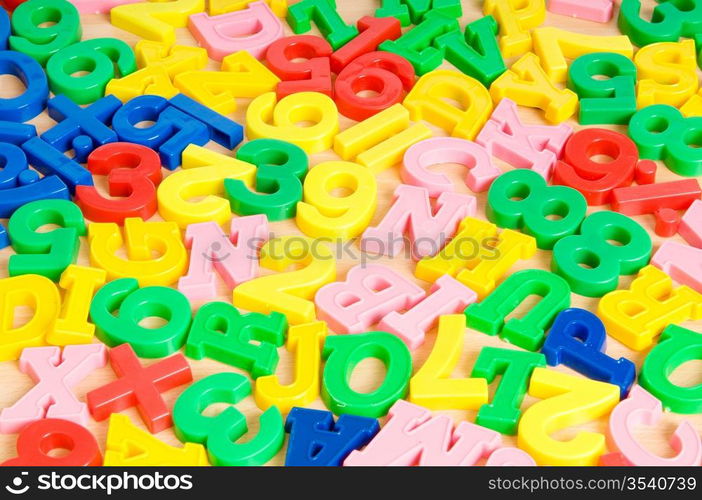 Children letters and digits on the table