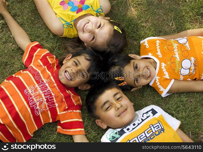 Children lying down together