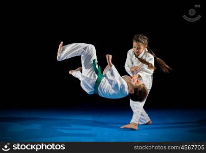 Children martial arts fighters isolated