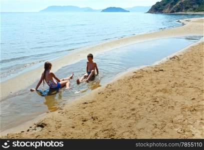 Children on Gerakas beach. Summer holidays (Greece, Ionian Sea).