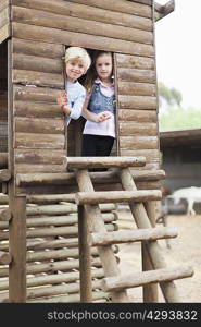 Children playing in playhouse