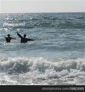 Children playing in sea, Vina Del Mar, Chile