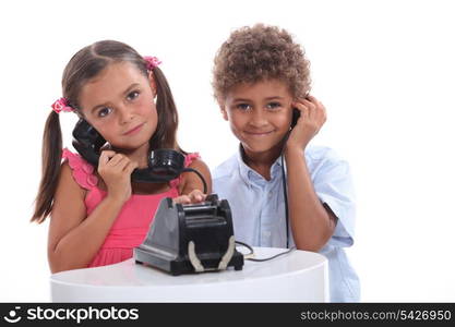 Children playing on the phone