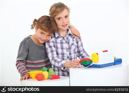 Children playing shop