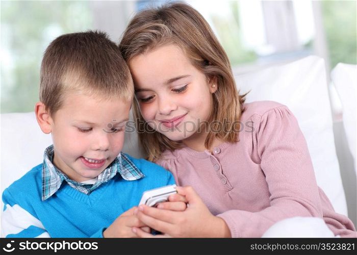 Children playing with smartphone