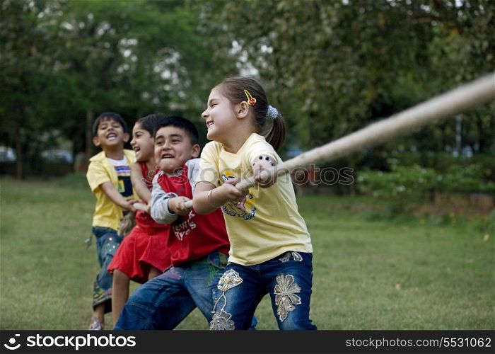 Children pulling a rope