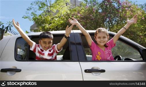 Children raising their arms