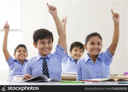 children raising their fingers up in class