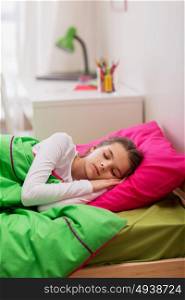 children, rest and people concept - girl sleeping in her bed at home. girl sleeping in her bed at home