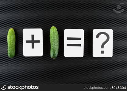 Children&rsquo;s arithmetic problem with cucumbers
