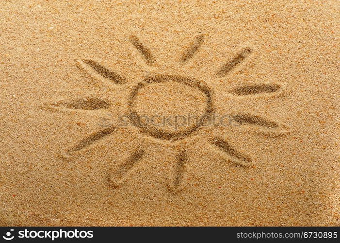 Children&rsquo;s drawing of the sun on sand