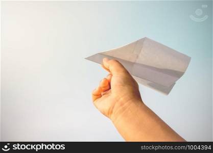 Children's hands are picking up paper planes in the sky, Future dream concept.