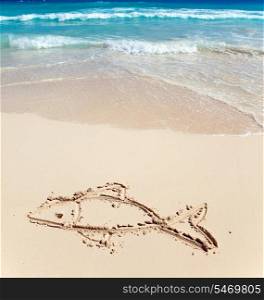 Children&rsquo;s picture on sand- a small fish