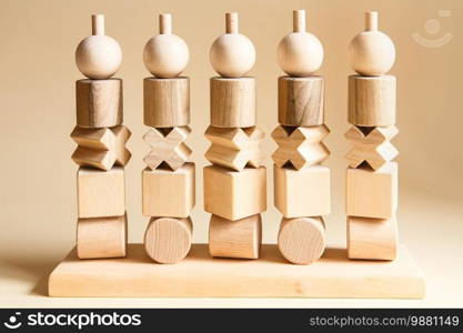 Children’s wooden toys. Sequencing Blocks learning resource for educating shapes, fine motor skills, hand eye coordination, mathematical skills. Natural wood construction set. Educational equipment