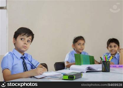  children studying in classroom