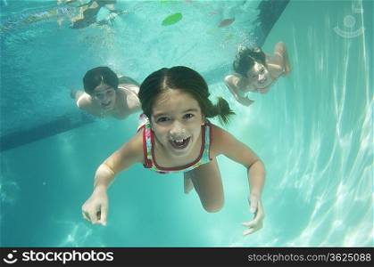 Children swimming, underwater view