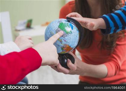 children touching globe. High resolution photo. children touching globe. High quality photo