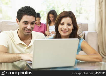 Children Using Laptop At Home